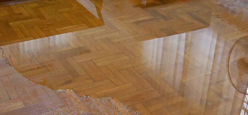 Laminate Wood Floor Water Damage Repair in Crown